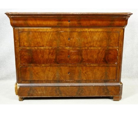 A 19th century French Louis Phillipe figured mahogany commode with marble top above four long drawers on plinth base. H.98 W.