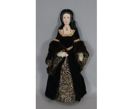 A boxed hand made painted ceramic and fabric doll of Anne Boleyn. With makers label, by Jean Westell. H.31cm 