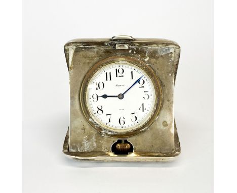 A white metal cased travelling clock, 7.5 x 8.5cm.