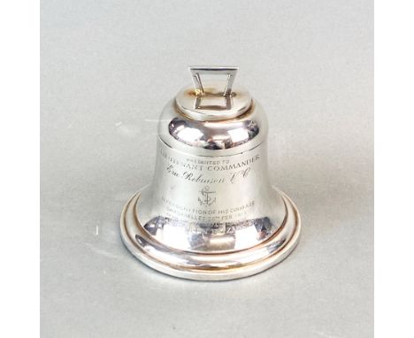 A hallmarked silver ink well (c.1914) engraved with ' Presented to lieutenant commander Eric Robinson, V. C. in recognition o