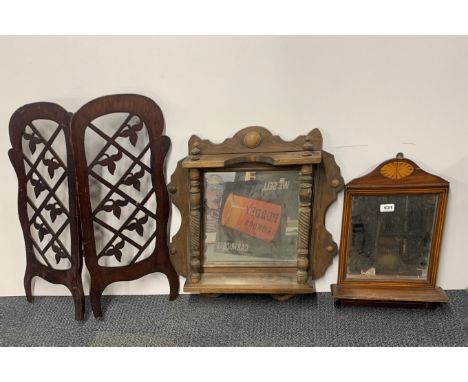 An Edwardian inlaid mahogany wall mirror, H. 50cm. Together with a folding fretwork firescreen and a Victorian oak hall mirro