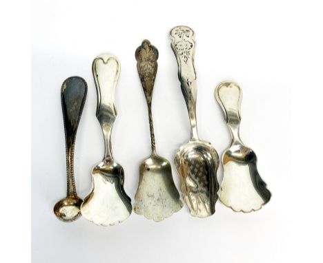 A group of hallmarked and sterling silver caddy spoons.