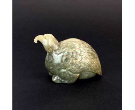 A Chinese carved jade model of a bird, H. 5cm. L. 7cm.