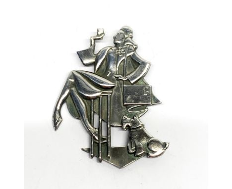 An Art Deco style metal brooch, H. 6cm.