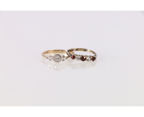 9ct diamond ring with central collet set round diamond flanked by smaller stones 1.8g and another set with paste stones 