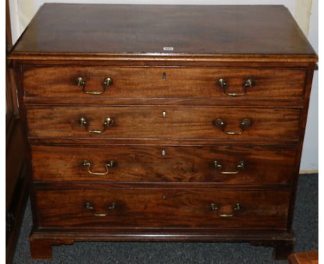 19th century mahogany chest of drawers with rectangular top having moulded edge, the frieze drawer containing a secret pop up