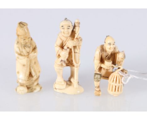 Two early 20th century Japanese netsuke one depicting a fisherman, the other a bird seller with a cage at his feet, 5.5cm and