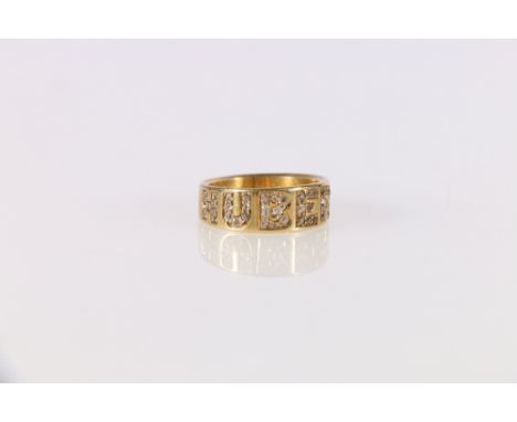 Unhallmarked diamond set ring, the diamond points arranged to spell Hubert, 6.8g 