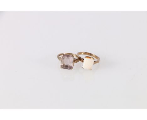 Two 9ct gold dress rings, one set with cushioned opal and the other with faceted quartz, 5.99g gross 