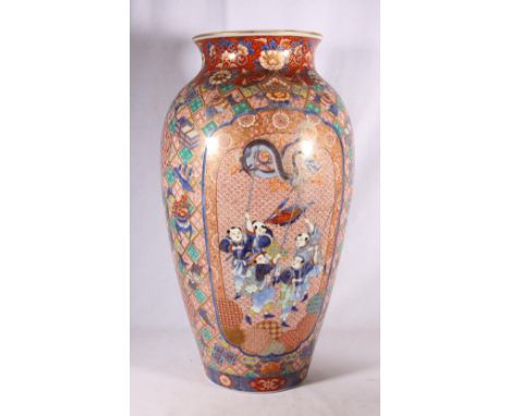 Large Japanese Koransha vase, the high shouldered vase decorated with panels of children holding a dragon puppet, reserved on