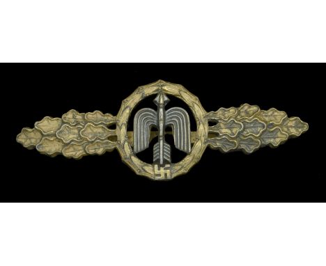A Luftwaffe Clasp for Fighter Aircraft in Gold. A good quality example. Gold plated with bright polished highlights, blued wi