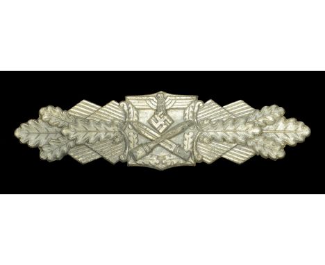 A Wehrmacht Close Combat Clasp in Silver. A very rare 1945 ‘Last Ditch’ production, the area behind the eagle and crossed bay