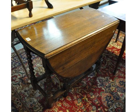 Early 20th Century oak barley twist gate legged table.(B.P. 21% + VAT) 