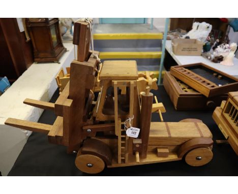 Well made working hardwood model of a Fork Lift Truck, by John C Davies of Hakin, Milford Haven, overall 68cm long approx.(B.