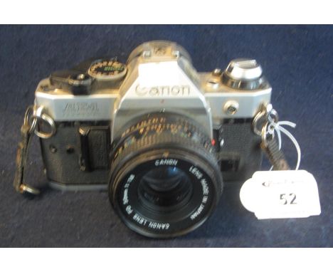 Canon AE-1 'Program' 35mm SLR camera with Canon 50mm lens.(B.P. 21% + VAT) Sold as seen, not tested.