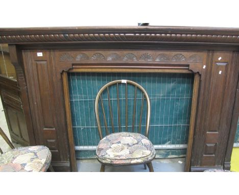 Good quality mahogany carved fire surround/mantelpiece having carved stylised floral and foliate decoration.(B.P. 21% + VAT) 