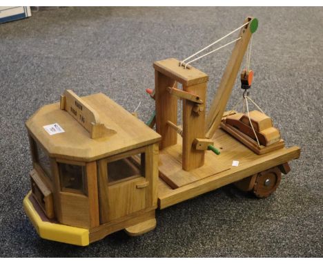 Well made hardwood toy model of a 'Hakin Road Tug' with crane and winch. Made by John C Davies of Hakin, Milford Haven. 56cm 