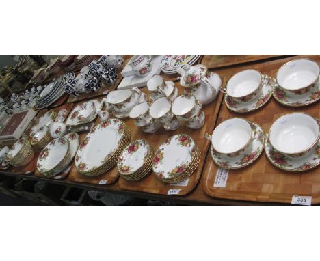 Five trays of Royal Albert 'Old Country Roses' design tea and dinnerware items, to include; cups, saucers, teapot, milk jug, 