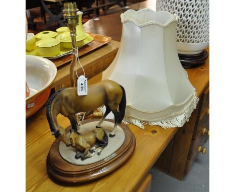 Italian ceramic table lamp with shade in the form of a horse and her foal on mahogany finish base, marked A. Belvari. (B.P. 2