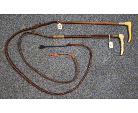 Two hunting crops, both having braided leather lash, one Swain and Adeney, with gate push. (2)(B.P. 21% + VAT) 