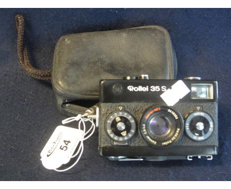 Rollei 35S compact camera in leather case. (B.P. 21% + VAT) Sold as seen, not tested.