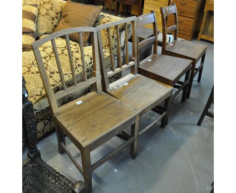 Pair of early 19th century oak bar back farmhouse chairs together with two similar 19th century farmhouse stick back chairs. 