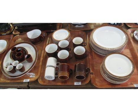 Six trays of Poole pottery oven to tableware, coffee and dinnerware items on a white and brown ground to include; cups, sauce