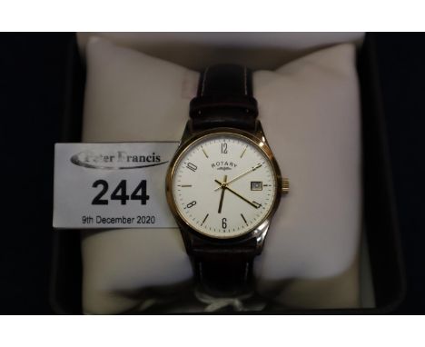 Rotary gold plated gentleman's quartz wristwatch with sweep seconds hand and date aperture on leather strap. Original box and