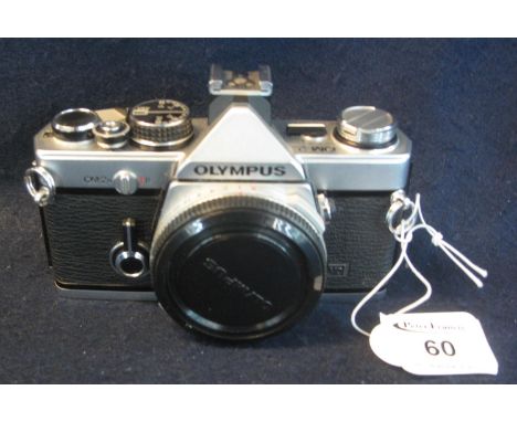 Olympus OM-2N 35mm SLR camera body.(B.P. 21% + VAT) Sold as seen, not tested.