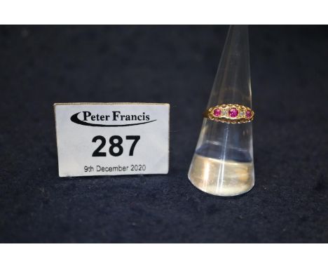 18ct gold ruby and diamond ring.  Size M.  Weight approximately 1.9 grams.(B.P. 21% + VAT) 