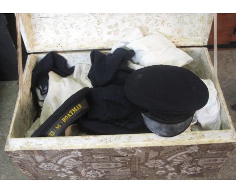 Vintage dome topped trunk, the interior revealing assorted naval clothing, licensed boatman hat etc.(B.P. 21% + VAT) 