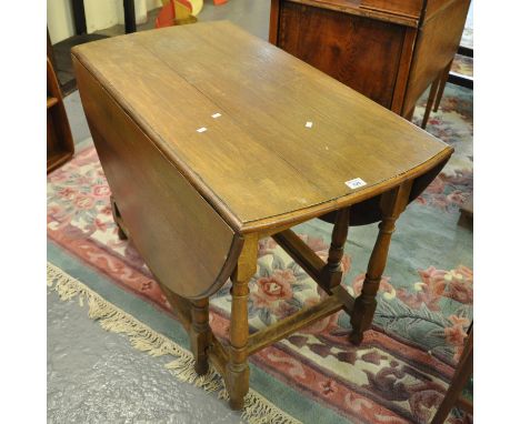 Early 20th Century oak gate legged table.(B.P. 21% + VAT) 