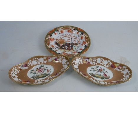 A 19th century Spode porcelain plate, decorated in the Imari palette, numbered 967, diameter 8.5ins, together with a pair of 