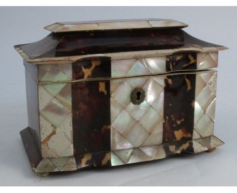 A Victorian tortoiseshell and mother of pearl tea caddy, with caddy top and serpentine front, the interior fitted with two co