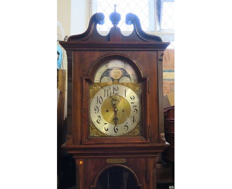 A mahogany cased long case clock, the brass dial with silvered chapter ring and moon phase above