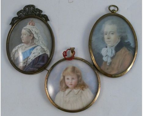 A circular framed portrait miniature, of a young girl with blonde hair, monogramed and dated, diameter 2.5ins, together with 