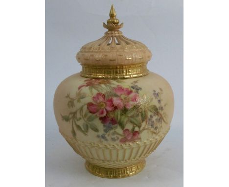 A Royal Worcester blush ivory crown top pot pourri, decorated with floral sprays with basket weave lower body, with pierced c