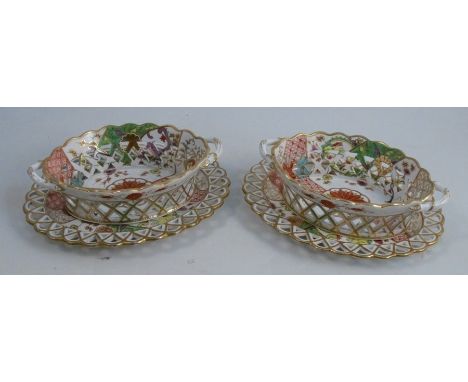 A pair of 19th century Spode oval pierced baskets and stands, decorated in an Oriental pattern, impressed mark, numbered 287,