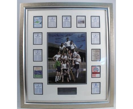 Tottenham Hotspur, a framed coloured photograph signed by the double winners 1961, with miniatures of the programmes, 24.5ins