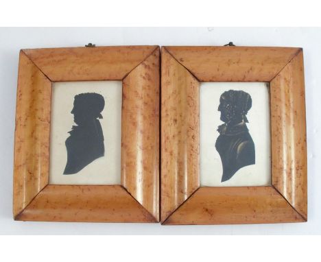 Two 19th century portrait silhouettes, the one highlighted in gilt, within maple frames, 4ins x 3ins