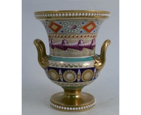 A 19th century Spode porcelain urn, with jewelled edges, decorated with bands of repeating patterns, numbered 1672, height 6.