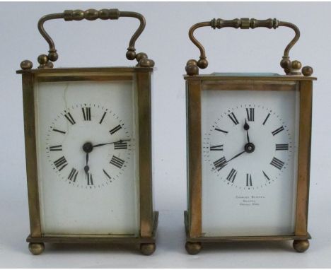 Two carriage clocks, with glass and gilt metal cases, the white enamel dials with Roman numerals, one inscribed Charles Despr