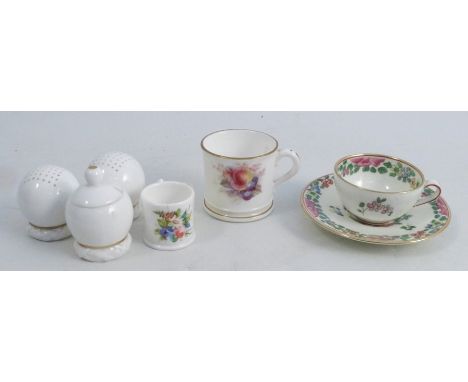 A Royal Worcester miniature mug, decorated with fruit, height 1.5ins, together with a Royal Worcester miniature cup and sauce