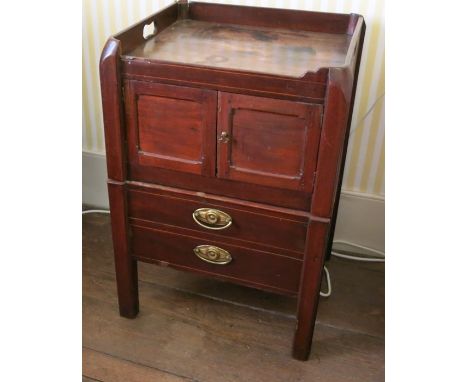 A Georgian mahogany tray top commode, the gallery top with integral handles, fitted with a cupboard below and pull out sectio