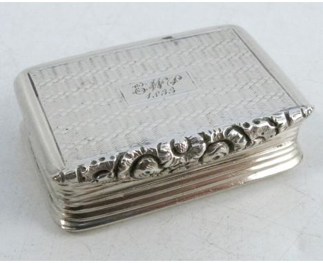 A Georgian silver vinaigrette, of rectangular form, with engine turning and floral opener, the top engraved with initials and