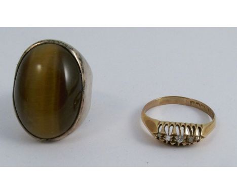 A five stone diamond 18 carat gold ring, Birmingham 1918, finger size T, 2.6g gross, together with a silver Tiger Eye ring