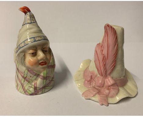A Royal Worcester candle snuffer, Mr Caudle, together with another of a feathered capCondition Report:  Inspected and no issu