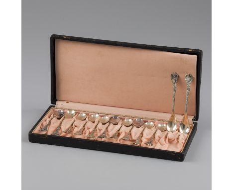 No reserve - 12-piece silver teaspoon set. Set decorated with 12 different flowers with name. Comes with matching pouch. The 