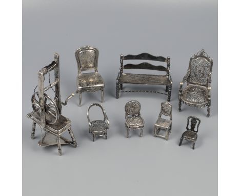 No reserve - Lot of 8 silver miniatures. Consisting of six (6) different chairs, a sofa and a spinning wheel. Netherlands / I