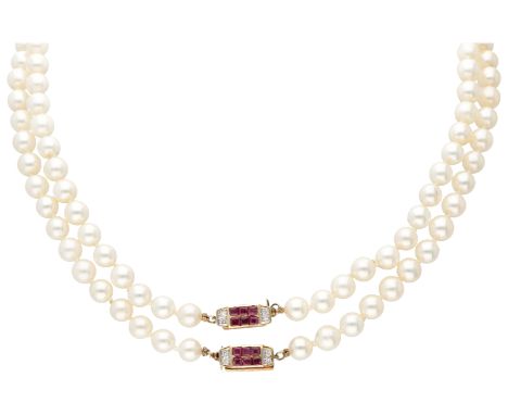 No reserve - Set of two pearl necklaces each with 14K yellow gold closure with diamond and natural ruby.  Set with eight bril